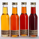 Vermont maple syrup from Maple Farmers showing all four grades in glass bottles